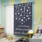 Decorative curtain with star pattern and 'sweet dreams' text in a modern room.
