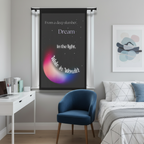 Decorative wall hanging with motivational quote and colorful moon design on a light purple wall.