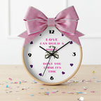 Wall clock with song lyrics on a white background
