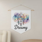 Decorative wall hanging with a dreamcatcher design and 'Dreamy' text, hanging on a wall.