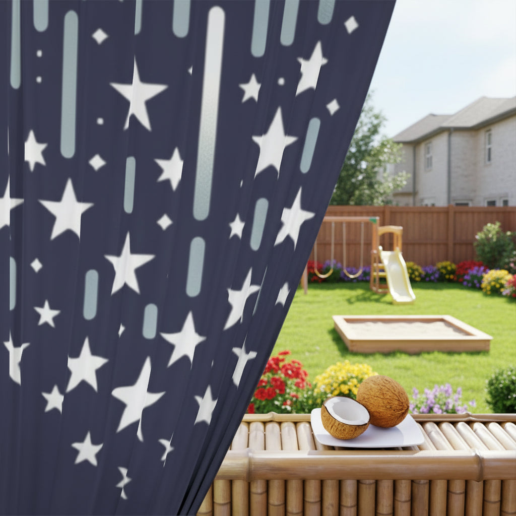 Navy curtain with white star pattern in front of a backyard setting with coconuts on a table.