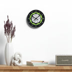 Wall clock with black and green design on a shelf with decorative items